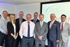 From l-r are Johnathan Berry CFO, Julie Price FD, Jim Quantrill Barclays Director, Denys Shortt OBE Chairman, Simon Whitehead CRO, Richard Lowe Barclays MD, Michael Lorimer CEO, Charles Shortt CMO